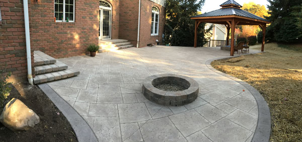 Stamped Concrete Firepit Patio with Dark Border